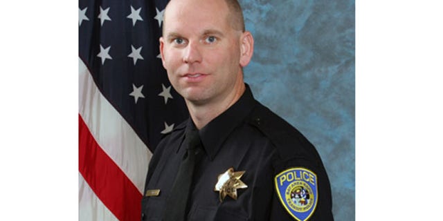 In this undated photo released by Bay Area Rapid Transit shows police Sgt. Tom Smith.