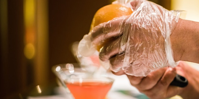 California bartenders have been told they must wear gloves when making drinks from now on, thanks to the introduction of a new food safety law.