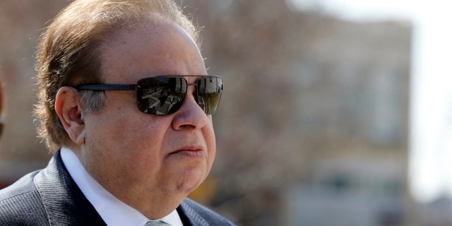 FILE - In this April 2, 2015, file photo, Dr. Salomon Melgen arrives at the Martin Luther King Jr. Federal Courthouse for his arraignment, in Newark, N.J. (AP Photo/Julio Cortez, File)