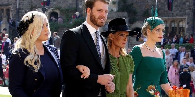 The dashing Louis Spencer, cousin of Prince Harry, with his sisters Eliza and Kitty Spencer, and their mother, Victoria Aitken, to the royal wedding.