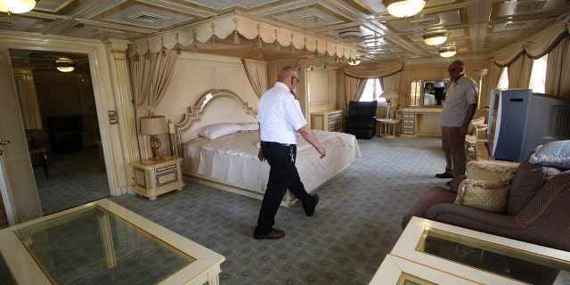 A captain walks inside the yacht called "Basrah Breeze", once owned by former Iraqi president Saddam Hussein, who was toppled in a U.S.-led invasion in 2003, in the southern port of Basra, Iraq May 14, 2018.