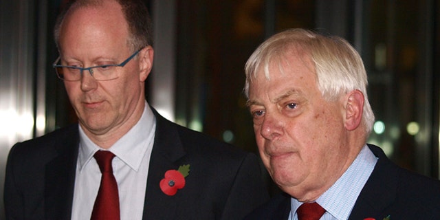Nov. 10, 2012: The BBC Director General, George Entwistle, left, stands with the Chairman of the BBC Trust, Lord Chris Patten, as he announces his resignation as Director General outside New Broadcasting House in central London, after recent news program problems.