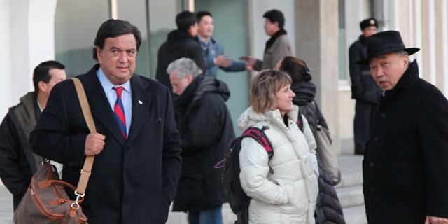 Dec. 16, 2010: In this photo released by China's Xinhua news agency, U.S. New Mexico Gov. Bill Richardson arrives in Pyongyang, North Korea.
