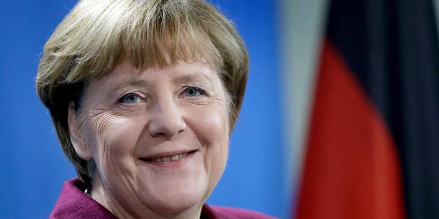FILE - In this Nov. 8, 2016 file photo German Chancellor Angela Merkel smiles during a joint news conference as part of a meeting with the Prime Minister of Norway, Erna Solberg, at the chancellery in Berlin, Germany. (AP Photo/Michael Sohn, file)