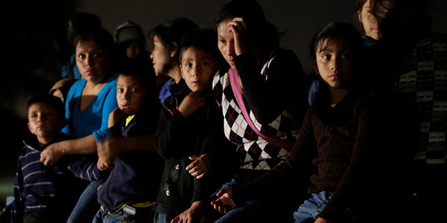 Group of  immigrants from Honduras and El Salvador are stopped in Granjeno, Texas, on June 25, 2014.