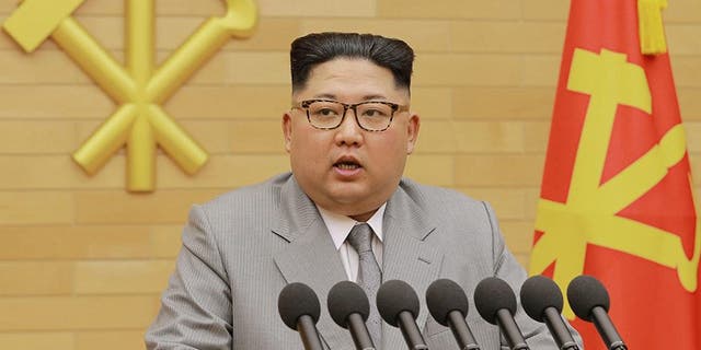 In this photo provided by the North Korean government, North Korean leader Kim Jong Un delivers his New Year's speech at an undisclosed place in North Korea Monday, Jan. 1, 2018. Kim said Monday the United States should be aware that his country's nuclear forces are now a reality, not a threat. Independent journalists were not given access to cover the event depicted in this image distributed by the North Korean government. The content of this image is as provided and cannot be independently verified. Korean language watermark on image as provided by source reads: "KCNA" which is the abbreviation for Korean Central News Agency. (Korean Central News Agency/Korea News Service via AP)