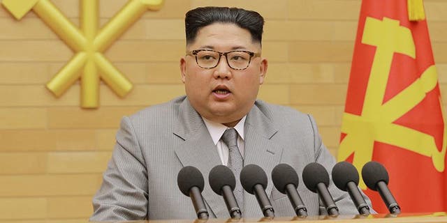 In this photo provided by the North Korean government, North Korean leader Kim Jong Un delivers his New Year's speech at an undisclosed place in North Korea Monday, Jan. 1, 2018. Kim said Monday the United States should be aware that his country's nuclear forces are now a reality, not a threat. Independent journalists were not given access to cover the event depicted in this image distributed by the North Korean government. The content of this image is as provided and cannot be independently verified. Korean language watermark on image as provided by source reads: "KCNA" which is the abbreviation for Korean Central News Agency. (Korean Central News Agency/Korea News Service via AP)