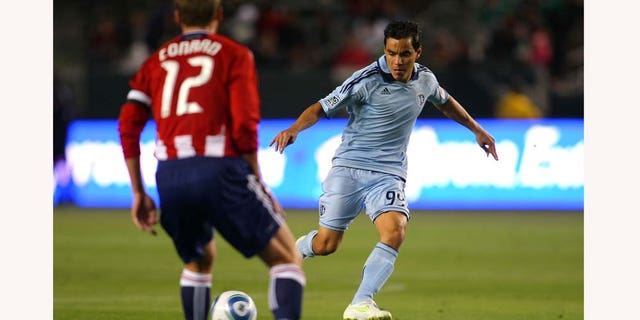 CARSON, CA - MARCH 19:  Omar Bravo #99 of Sporting Kansas City passes the ball in the first half during the MLS match against Chivas USA at The Home Depot Center on March 19, 2011 in Carson, California. SKC defeated Chivas USA 3-2. (Photo by Victor Decolongon/Getty Images)