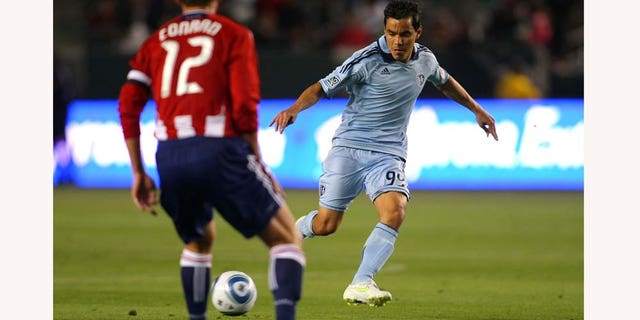 CARSON, CA - MARCH 19: Omar Bravo #99 of Sporting Kansas City passes the ball in the first half during the MLS match against Chivas USA at The Home Depot Center on March 19, 2011 in Carson, California. SKC defeated Chivas USA 3-2. (Photo by Victor Decolongon/Getty Images)