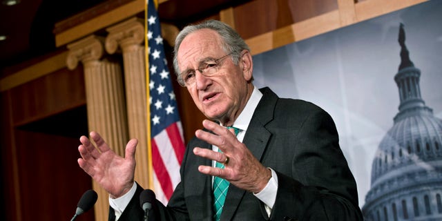 Sen. Tom Harkin, D-Iowa, chairman of the Health, Education, Labor, and Pensions Committee, talks to reporters after the Senate cleared a major hurdle and agreed to proceed to debate a bill that would prohibit workplace discrimination against gay, bisexual and transgender Americans, at the Capitol in Washington, Monday, Nov. 4, 2013. The bipartisan vote increases the chances that the Senate will pass the bill by week's end, but its prospects in the Republican-led House are dimmer. (AP Photo/J. Scott Applewhite)