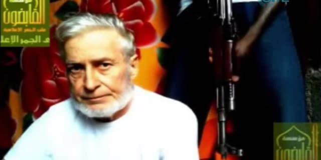 This image taken from a video released by the SITE Intelligence Group shows French enginner Francis Collomp, who is being held hostage by the Nigeria-based Ansar al-Muslimeen.