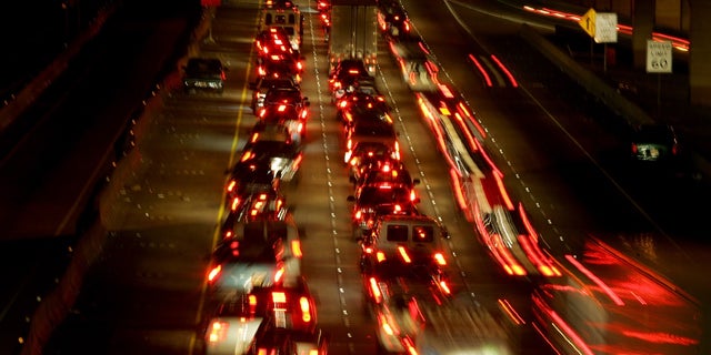 Thousands of cars try to evacuate to Dallas in advance of Hurricane Rita in north Houston September 22, 2005. Hurricane Rita weakened to a still dangerous Category 4 storm with maximum sustained winds of 150 miles per hour, the U.S. National Hurricane Center said in an advisory on Thursday. REUTERS/Carlos Barria - RTRP3OS