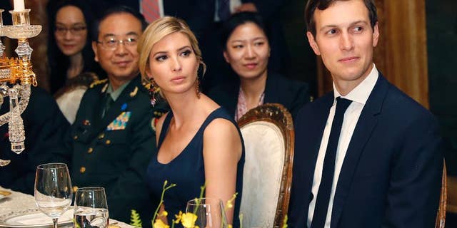 FILE - In this Thursday, April 6, 2017, file photo, Ivanka Trump, second from right, the daughter and assistant to President Donald Trump, is seated with her husband White House senior adviser Jared Kushner, right, during a dinner with President Donald Trump and Chinese President Xi Jinping, at Mar-a-Lago, in Palm Beach, Fla. China's Ministry of Foreign Affairs spokesman Lu Kang on Wednesday defended the handling of the applications of the trademarks won by U.S. President Donald Trump’s daughter Ivanka and her company, saying that all such requests are handled fairly. (AP Photo/Alex Brandon, File)