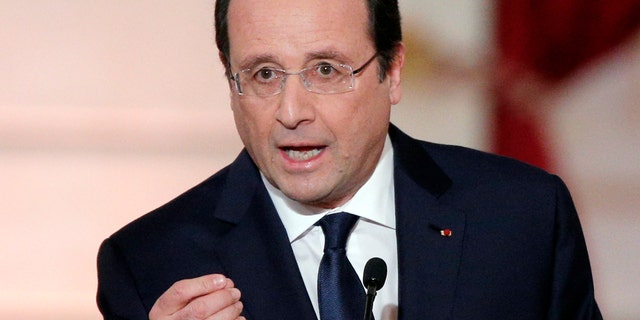 French President Francois Hollande delivers his speech at his annual news conference, Tuesday, Jan.14, 2014 at the Elysee Palace in Paris. The French president's complex personal life — and what it means to be the first lady in modern society — may get a full airing as Hollande answers questions for the first time since a tabloid reported he was having an affair with an actress. (AP Photo/Christophe Ena)