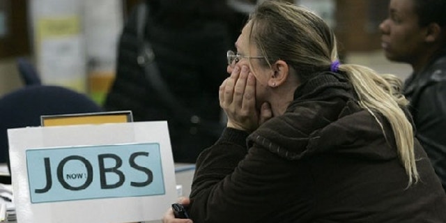 Nov. 20: A worker awaits the start of seminars for job seekers at an employment center in San Francisco, Calif., where unemployment in November was 12.3 percent. The national unemployment rate peaked at 10.2 percent in October (Reuters).