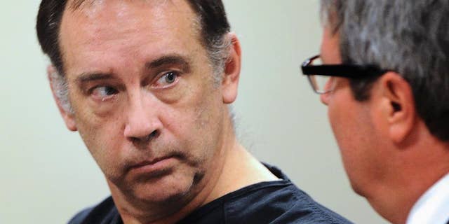 FILE - In this Aug. 5, 2014, file photo, former suburban Milwaukee police officer Steven Zelich, left, of West Allis, Wis., appears in court in Kenosha, Wis. Zelich, who is accused of killing two women and ditching their bodies in suitcases along a rural Wisconsin highway, pleaded guilty Friday, Feb. 3, 2017, in the slaying of one of the women at a Rochester, Minn., hotel in 2013. Zelich was sentenced to 25 years in prison. (Sean Krajacic /The Kenosha News via AP, File)