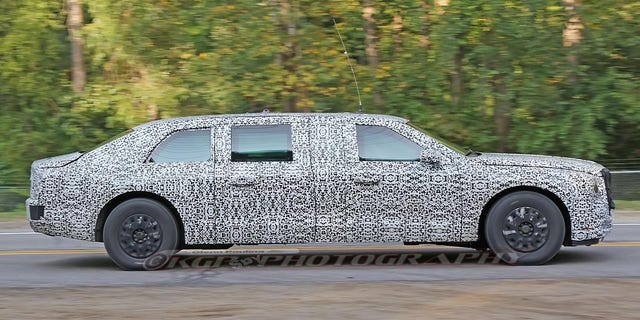 The prototype is covered in a black and white camouflage wrap to hide its styling details until its official unveiling.