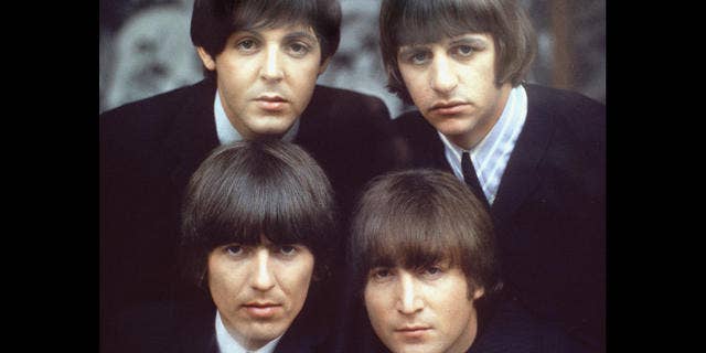 The Beatles are shown on an album cover in 1965. Clockwise, from top left, are: Paul McCartney, Ringo Starr, John Lennon, and George Harrison.