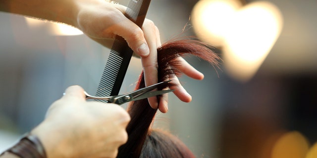 A Reddit user feared he had gone through a "unwritten limit" while cutting her son-in-law's hair.  As a rule, she says, her sons-in-law get their hair cut at hairdressers.  But this time her 10-year-old stepson asked her to - so after checking with her husband (the boy's father) she went ahead and did it.
