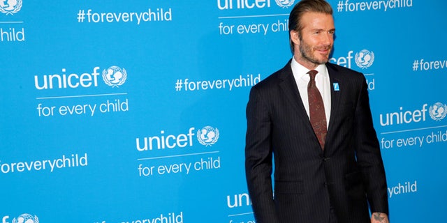David Beckham is denying claims he used his relationship with UNICEF to campaign for knighthood.