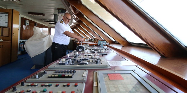 A captain inspects the "Basrah Breeze," which is said to be in a very good condition.