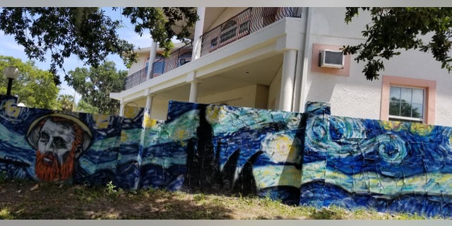 The couple first commissioned the rendition of “Starry Night” for the 40-foot-wall (above) in front of their home. But before the wall was even finished, the city sent the homeowners a graffiti notice and ordered that the wall and house must match. After the citation, the owners had the artist paint their entire house in the same theme of the Dutch master’s 1889 masterpiece.