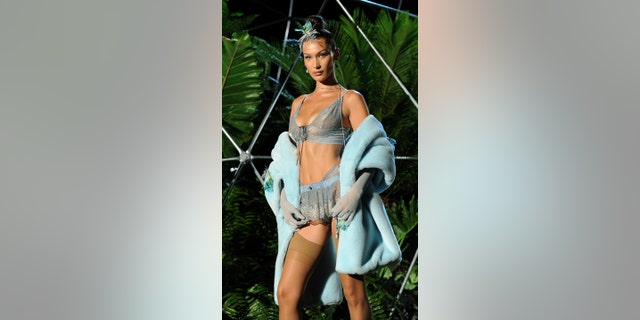 Bella Hadid poses in Rihanna's new collection of lingerie.