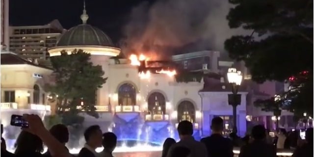 The fire tore through part of a roof of the hotel.