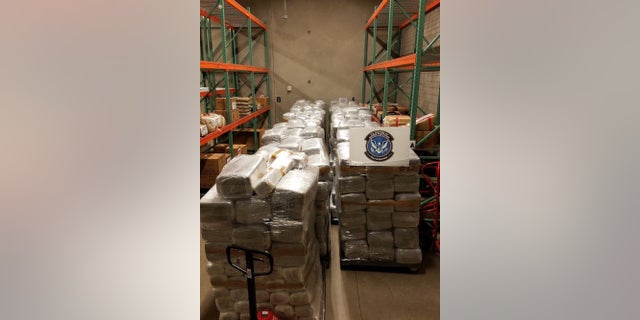 U.S. Customs and Border Protection officers in Nogales, Arizona, seized 13,700 pounds of marijuana, worth more than $6.8 million, that was hidden among bell peppers on a tractor trailer at the Mariposa Commercial Facility on Saturday, May 13, 2017 .