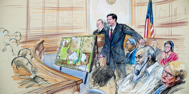 This courtroom sketch depicts Ahmed Abu Khattala listening to a interpreter through earphones during the opening statement by assistant U.S. attorney John Crabb, second from left, at federal court in Washington in the trial presided by U.S. District Judge Christopher Cooper, Monday, Oct. 2, 2017.