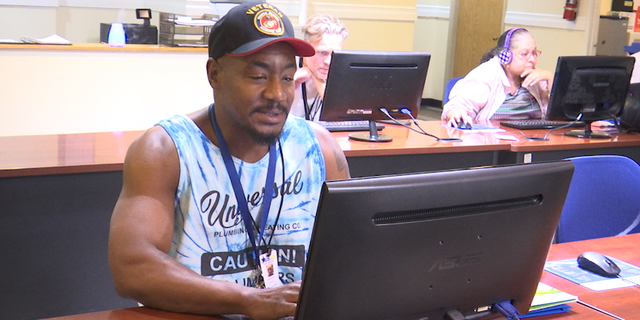 Benjamin Dupree sits at a veterans career services center in Las Vegas. He served in the U.S. Marine Corps during Operation Desert Storm.