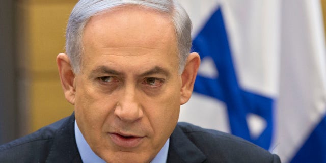 Dec. 3, 2014: Israeli Prime Minister Benjamin Netanyahu speaks during a faction meeting at the Knesset, Israel's parliament in Jerusalem.
