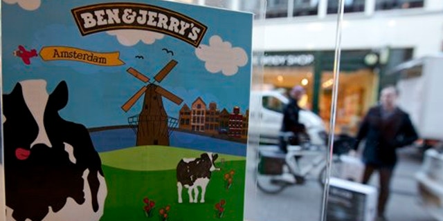 Feb. 2, 2012: People pass a Ben &amp; Jerry's ice cream franchise store in Amsterdam, Netherlands.