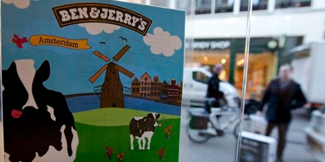Feb. 2, 2012: People pass a Ben & Jerry's ice cream franchise store in Amsterdam, Netherlands.