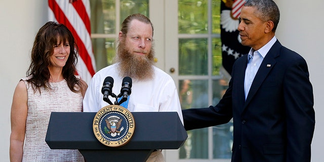 Bowe Bergdahl's parents stand in the Rose Garden with President Obama when Bergdahl's release was announced.