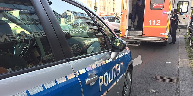 Two homeless men were set on fire by an unknown assailant at a Berlin railway station, police said.
