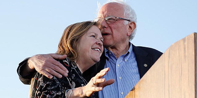 U.S. Democratic presidential candidate Bernie Sanders and embraces his wife Jane on stage during a rally in Vallejo, California, May 18, 2016. REUTERS/Stephen Lam - RTSEY2E