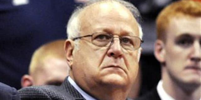 Nov. 14, 2011: In this photo, Syracuse basketball assistant coach Bernie Fine watches a college basketball game against Manhattan in the NIT Season Tip-Off in Syracuse, N.Y.