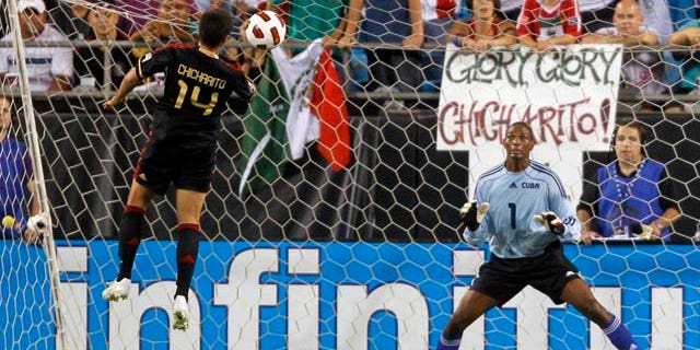 Javier "Chicharito" Hernandez of El Tri scoring a goal against Cuba on June 9, 2011.