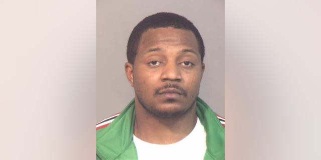 This undated handout photo provided by the Anne Arundel County Police Department shows Tavon White, who prosecutors say oversaw a drug smuggling operation inside the Baltimore City Detention Center and used contraband cellphones to direct gang activity on the streets. White is scheduled to be sentenced in federal court in Baltimore, Monday, Feb. 9, 2015, after pleading guilty to participating in the racketeering conspiracy. (AP Photo/Anne Arundel County Police Department)