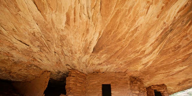 This June 22, 2016, photo, the "House on Fire" ruins are shown in Mule Canyon, near Blanding, Utah. These Anasazi ruins are found along a canyon hiking path in a dry river bed. They are one of an estimated 100,000 archaeological sites within a 1.9-million acre area of Utah's red rock country that a coalition of American Indian tribes and environmentalists want President Barack Obama to designate as a national monument to ensure protections of lands considered sacred. (AP Photo/Rick Bowmer)