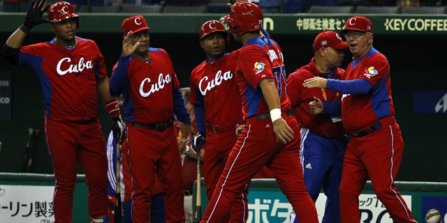 TOKYO, JAPAN - MARCH 11: Infielder Jose Abreu #79 of Cuba celerates after scoring in the top half of the fourth inning during the World Baseball Classic Second Round Pool 1 game between Cuba and the Netherlands at Tokyo Dome on March 11, 2013 in Tokyo, Japan. (Photo by Koji Watanabe/Getty Images)