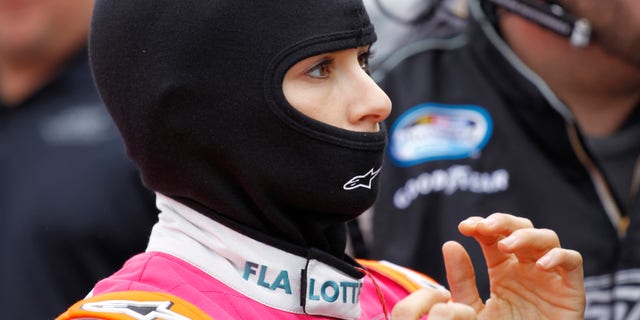 Danica Patrick prepares for the NASCAR Nationwide series auto race at Daytona International Speedway in Daytona Beach, Fla., Saturday, Feb. 22, 2014. (AP Photo/Terry Renna)