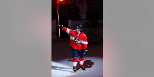 Florida Panthers right wing Jaromir Jagr (68) acknowledges the fans after the NFL hockey game against the Buffalo Sabres, Tuesday, Dec. 20, 2016, in Sunrise, Fla. Jagr tied Mark Messier for 2nd pace overall in NHL scoring with 1,887 points. The Panthers defeated the Sabres 4-3 in a shoot out. (AP Photo/Joel Auerbach)