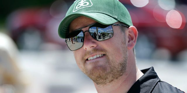 NASCAR driver Justin Allgaier looks on during a promotion for the DuPont Pioneer 250 NASCAR Nationwide Series on May 20, 2013, in Des Moines, Iowa. (AP Photo/Charlie Neibergall)