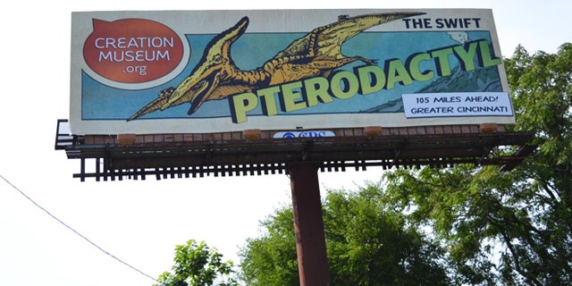 June 11, 2012: A billboard in Louisville, Ky., shows a new ad campaign for the Creation Museum. A new nationwide billboard ad campaign is using dinosaurs to attract visitors to the Bible-based center near Cincinnati. The museum has exhibits that challenge evolution science and promote a literal interpretation of the Old Testament's creation story.