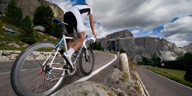 Road cyclists enjoy the mountain passes in the Dolomites