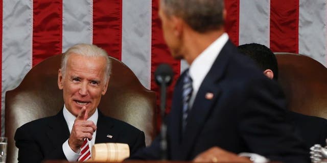 Jan. 12, 2016: Vice President Joe Biden points at President Barack Obama during the State of the Union address to a joint session of Congress on Capitol Hill in Washington.