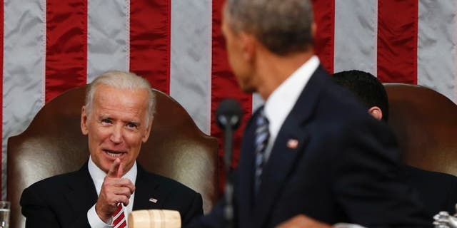 Jan. 12, 2016: Vice President Joe Biden points at President Barack Obama during the State of the Union address to a joint session of Congress on Capitol Hill in Washington.