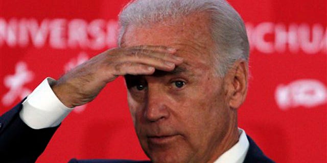 Vice President Biden looks for questions from audience members after delivering a speech at Sichuan University in Chengdu in southwestern China Aug. 21.